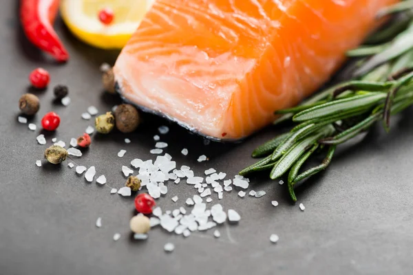 Fresh salmon with spices — Stock Photo, Image