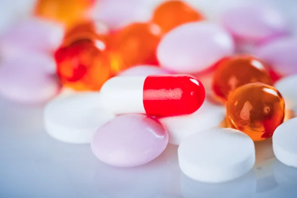 Colorful tablets with capsules — Stock Photo, Image