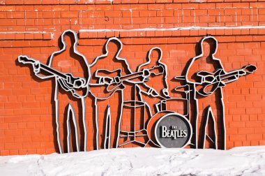 YEKATERINBURG, RUSSIA - FEB 26: Monument to The Beatles on feb 26, 2012 in Yekaterinburg, Russia. Monument was installed on May 23, 2009, and this is the first monument to The Beatles in Russia. clipart