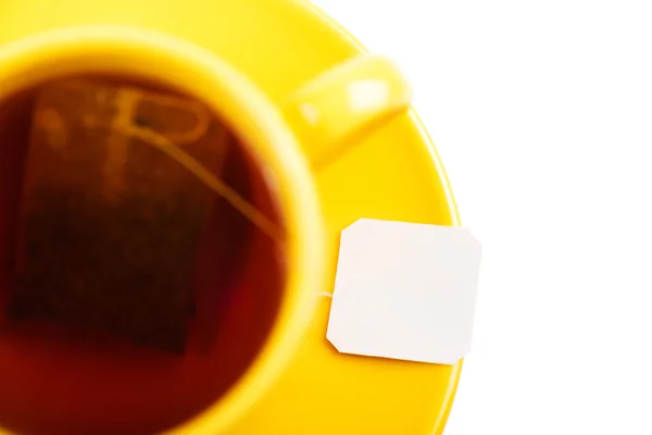 Taza de té con bolsa de té (etiqueta en blanco ) —  Fotos de Stock
