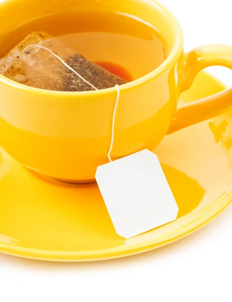 Taza de té con bolsa de té (etiqueta en blanco ) —  Fotos de Stock