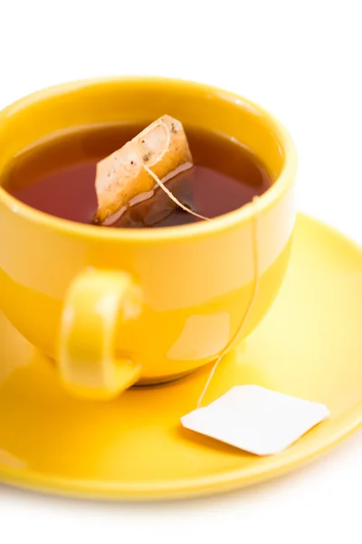 Tazza di tè con bustina di tè (etichetta in bianco ) — Foto Stock