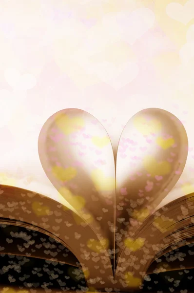Pages of a book curved into a heart shape (sepia) — Stock Photo, Image
