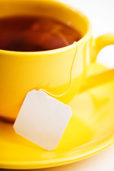 Xícara de chá com saco de chá (etiqueta em branco ) — Fotografia de Stock
