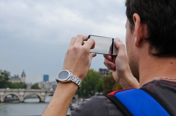 Tourist taking photo with  smart phone — Stock Photo, Image