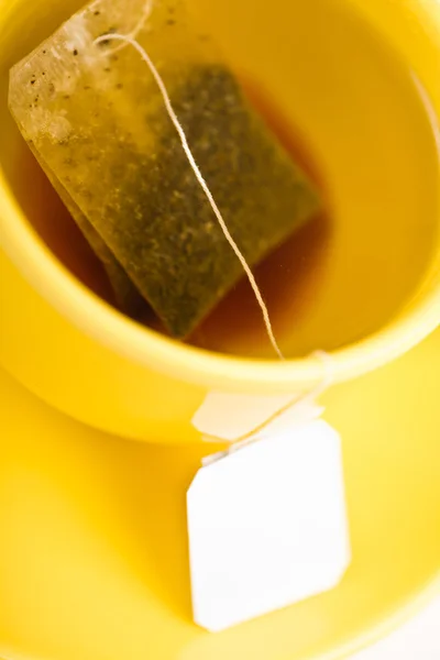 Kopp te med tepåse — Stockfoto