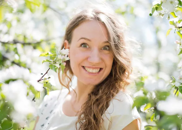 Girl with apple blossom — Stock Photo, Image