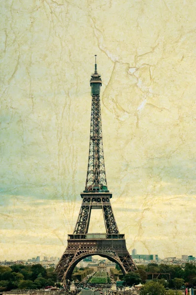 Famous Eiffel Tower in Paris, France. Grunge style photo. — Stock Photo, Image