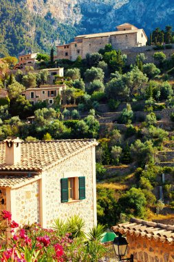 Mountain village Deia in Mallorca clipart