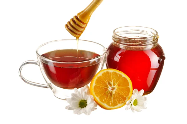 Pot de miel et tasse de thé — Photo