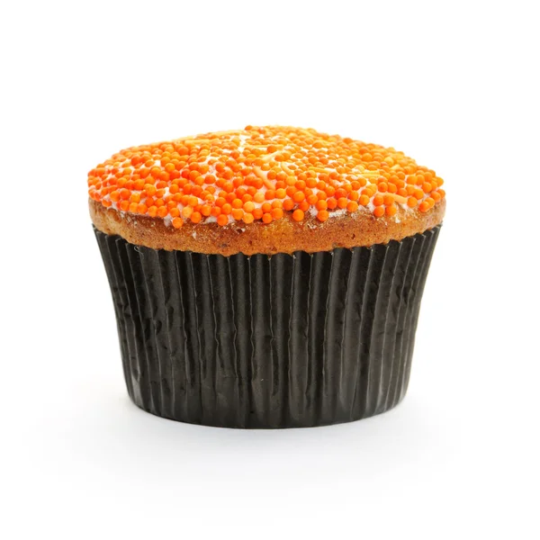 Cupcake with orange icing — Stock Photo, Image
