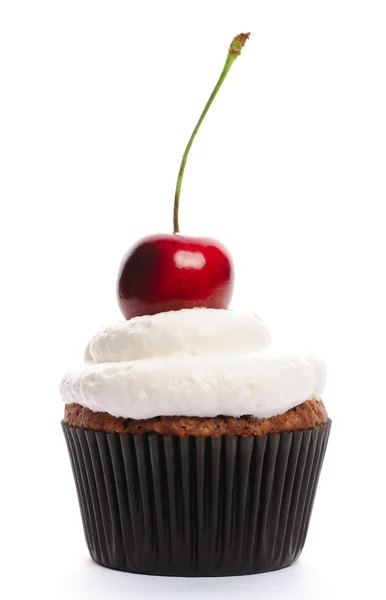 Cupcake con crema batida y cereza — Foto de Stock