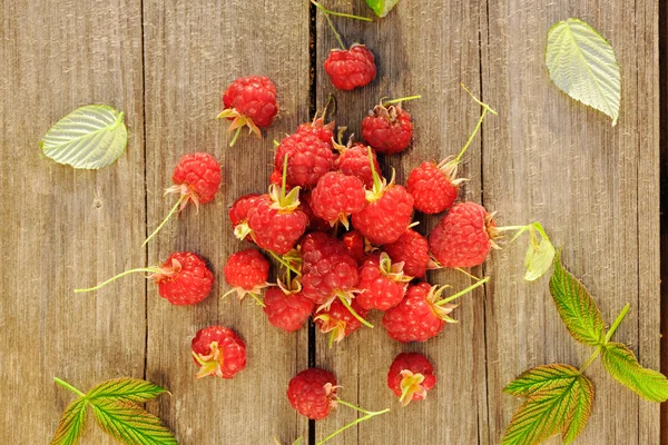 Raspberry on wooden table — Stock Photo, Image