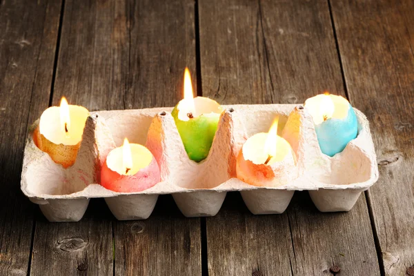 Colored easter eggs candles — Stock Photo, Image