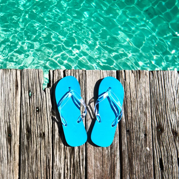 Slippers at jetty — Stock Photo, Image