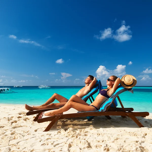 Couple on a beach Royalty Free Stock Photos