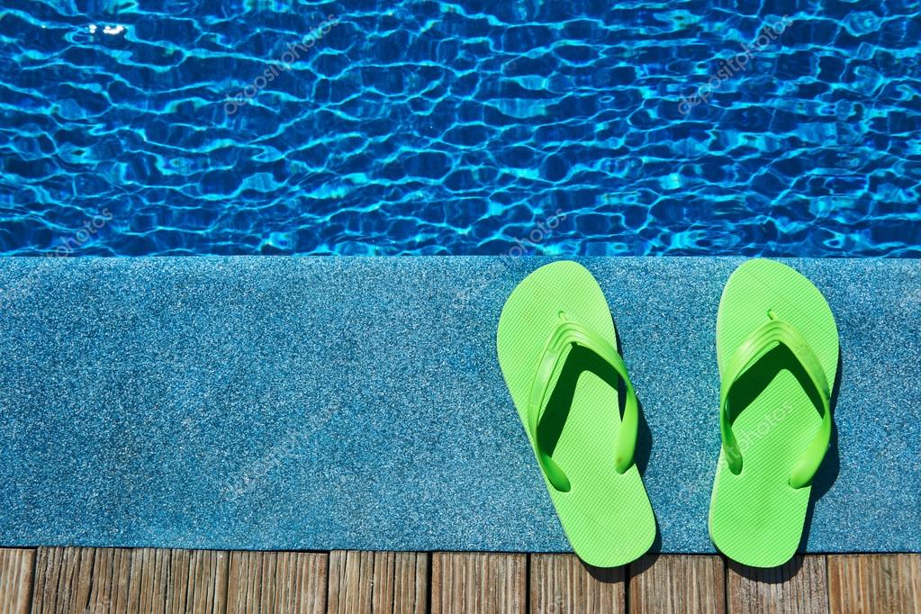 Slippers by a pool Stock Photo by ©haveseen 22625141