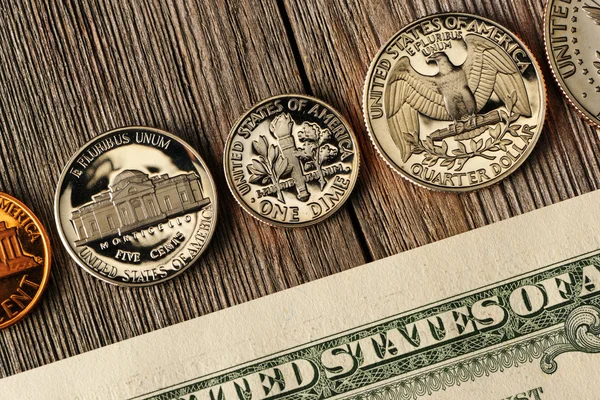 US money over wooden background — Stock Photo, Image