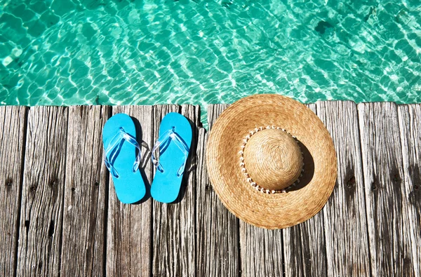 Slippers at jetty Royalty Free Stock Photos