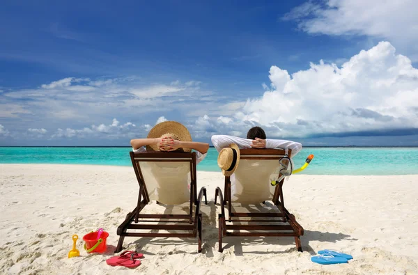 Couple on a beach Royalty Free Stock Images