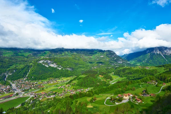 Swiss village at Alps — Stock Photo, Image