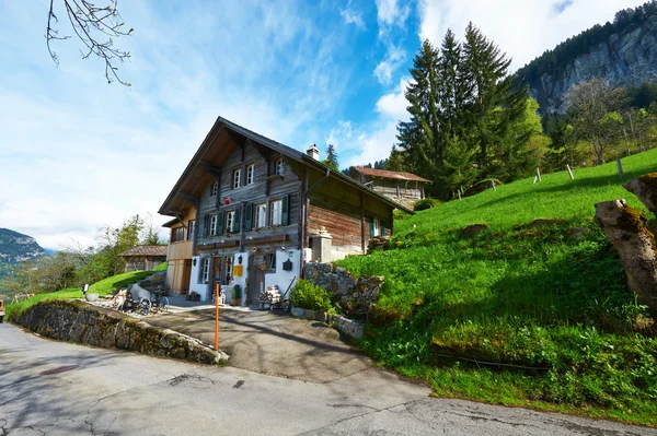 Swiss chalet at Alps — Stock Photo, Image