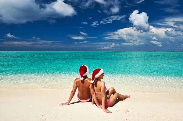 Par i Tomtemössa på en strand på Maldiverna — Stockfoto