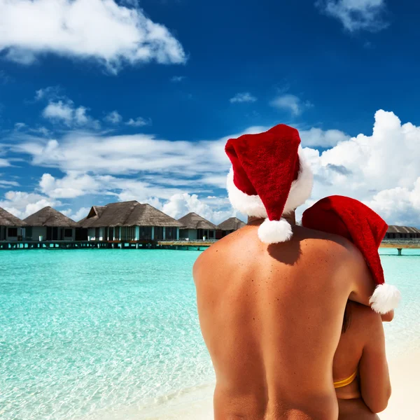 Pareja en sombrero de Santa Claus —  Fotos de Stock