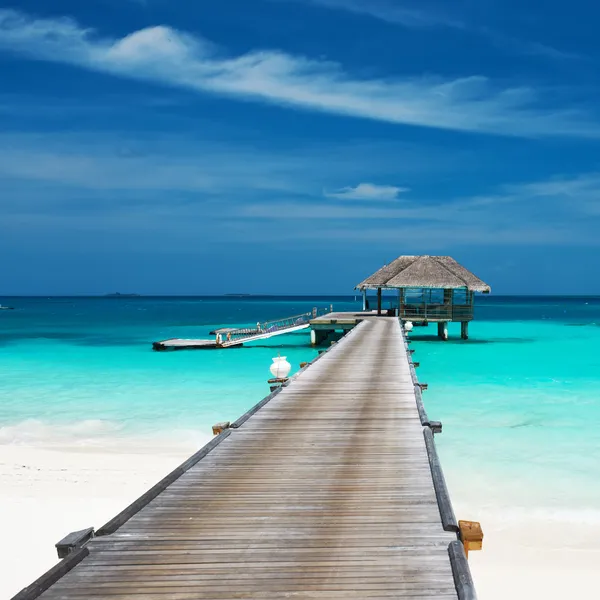 Strand met water bungalows — Stockfoto