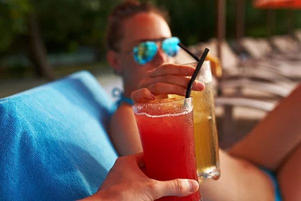 Clinking glasses with cocktails — Stock Photo, Image