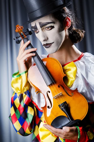 Clown spelen op de viool — Stockfoto