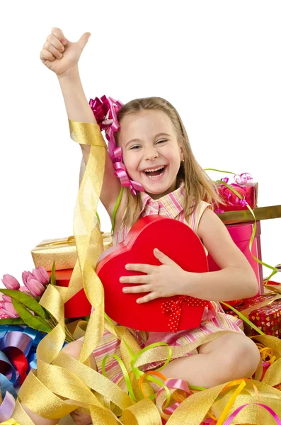 Conceito de celebração com menina e caixas de presente — Fotografia de Stock