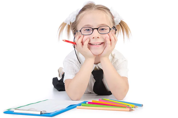 Petite fille écrivant avec des crayons — Photo