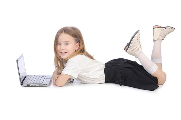 Leuk meisje met laptop op witte — Stockfoto