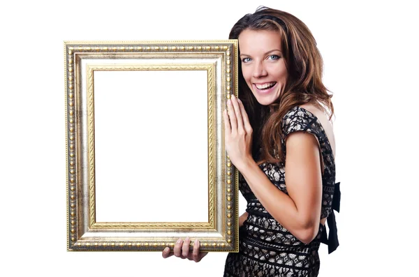 Mujer joven con marco de imagen en blanco — Foto de Stock