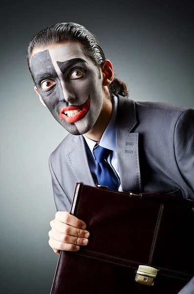 Businessman with clown face paint — Stock Photo, Image