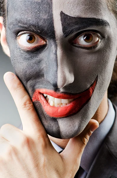 Podnikatel barvou klaun tvář — Stock fotografie