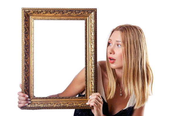 Young woman with picture frame on white — Stock Photo, Image