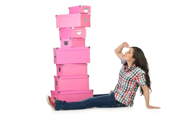Meisje met stapel giftboxes — Stockfoto