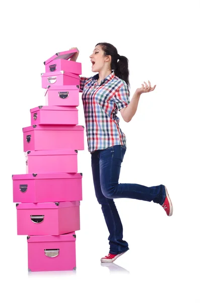 Fille avec pile de boîtes-cadeaux sur blanc — Photo