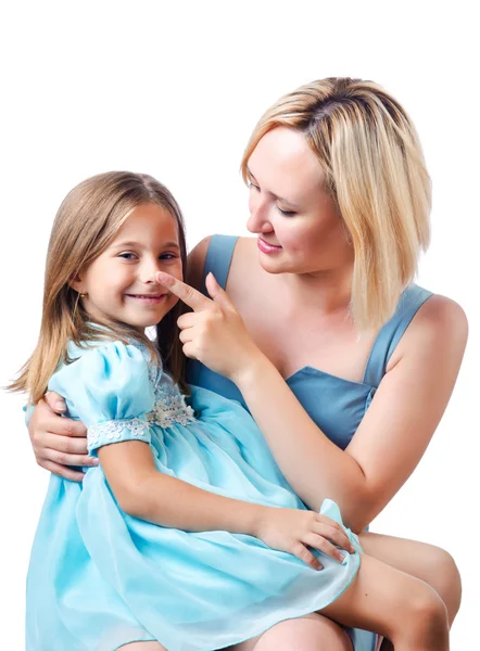 Feliz mamá y su hija en blanco — Foto de Stock