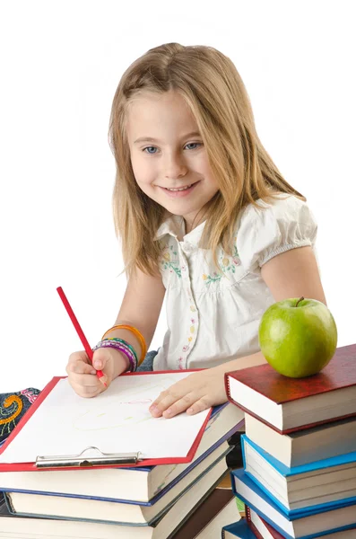 Kleines Mädchen schreibt mit Bleistiften — Stockfoto