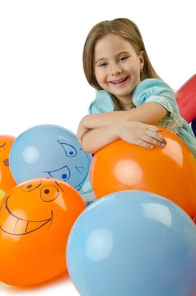 Bambina con palloncini su bianco — Foto Stock