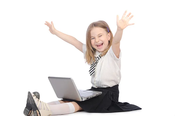 Söt flicka med laptop på vit — Stockfoto