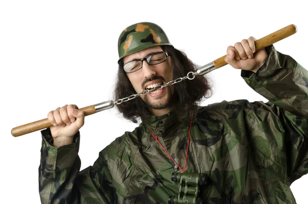 Roliga soldat med nunchaku — Stockfoto