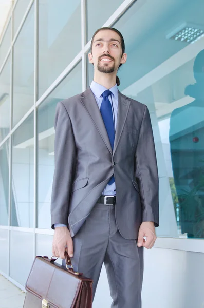 Young businessman on the street Royalty Free Stock Photos