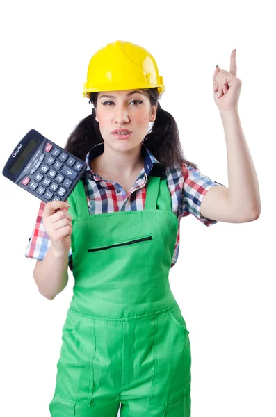 Женщина строитель с калькулятором на белом — стоковое фото