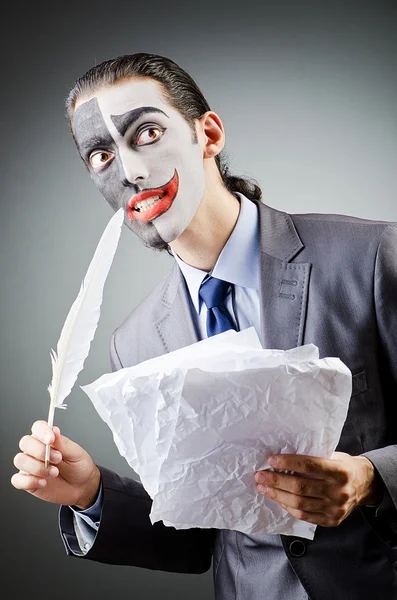 Businessman with clown face paint — Stock Photo, Image