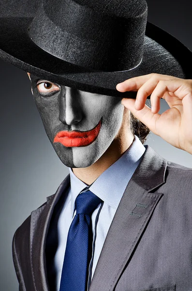 Homme d'affaires avec peinture visage de clown — Photo