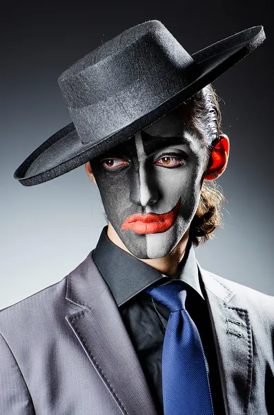 Homme d'affaires avec peinture visage de clown — Photo